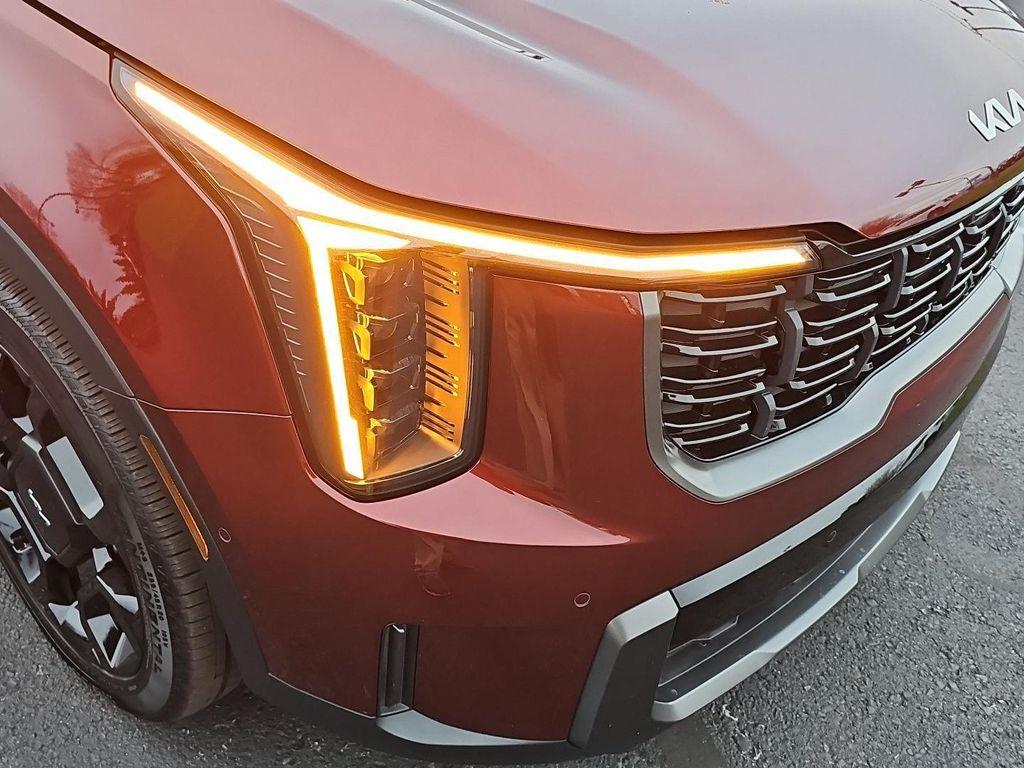 2024 Dawning Red Kia Sorento