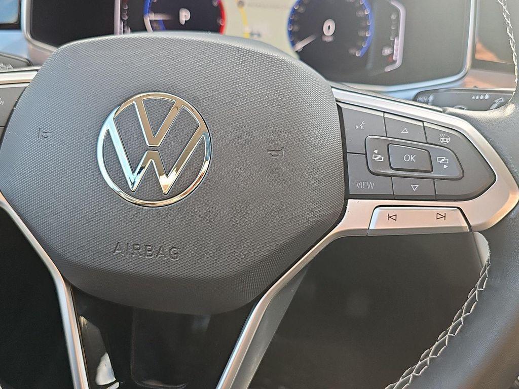 used 2025 Volkswagen Taos car, priced at $27,000