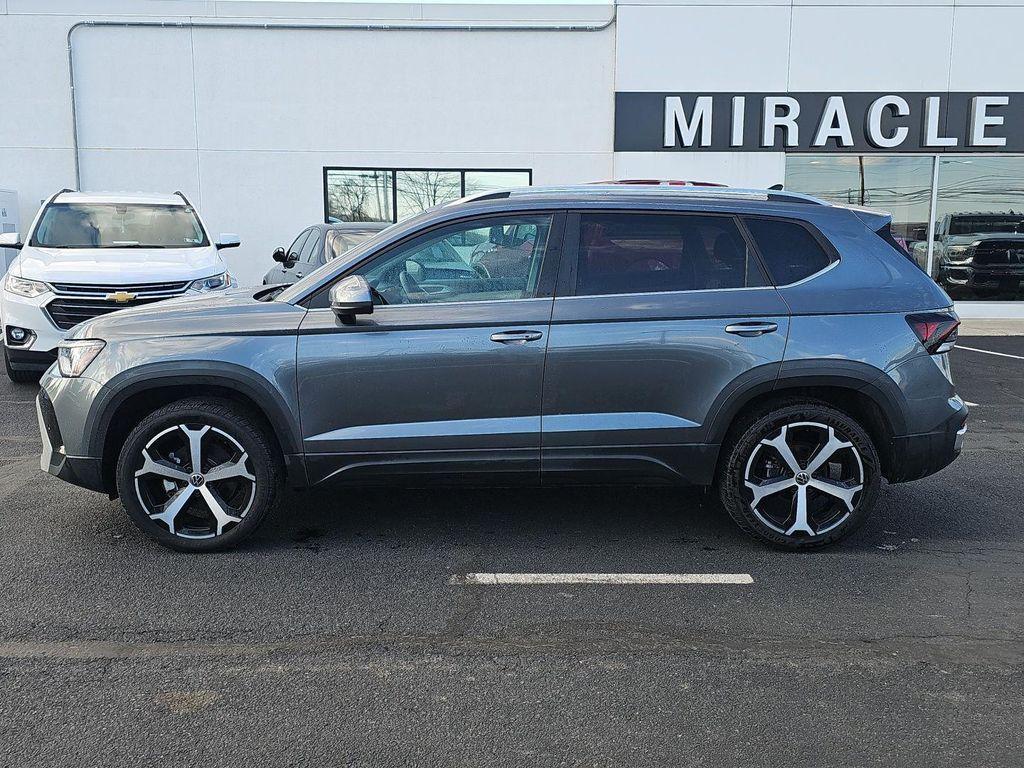 used 2025 Volkswagen Taos car, priced at $27,000