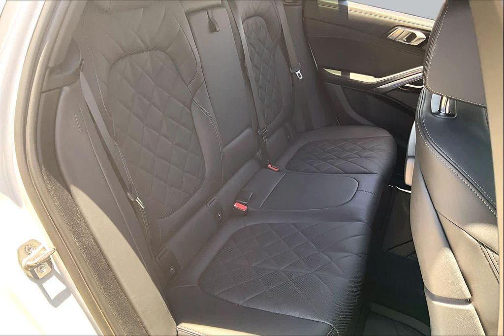 used 2023 BMW X6 car, priced at $59,338
