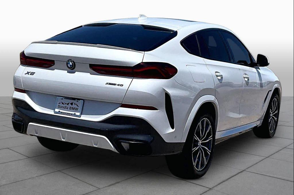 used 2023 BMW X6 car, priced at $59,338
