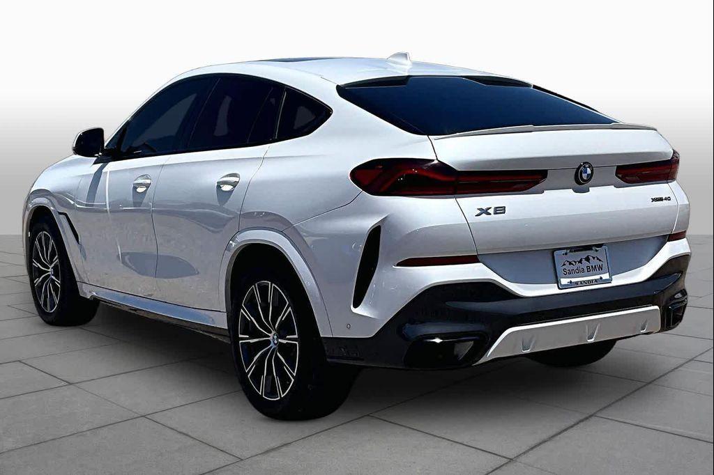 used 2023 BMW X6 car, priced at $59,338