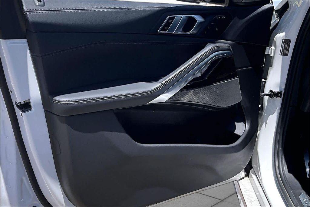 used 2023 BMW X6 car, priced at $59,338