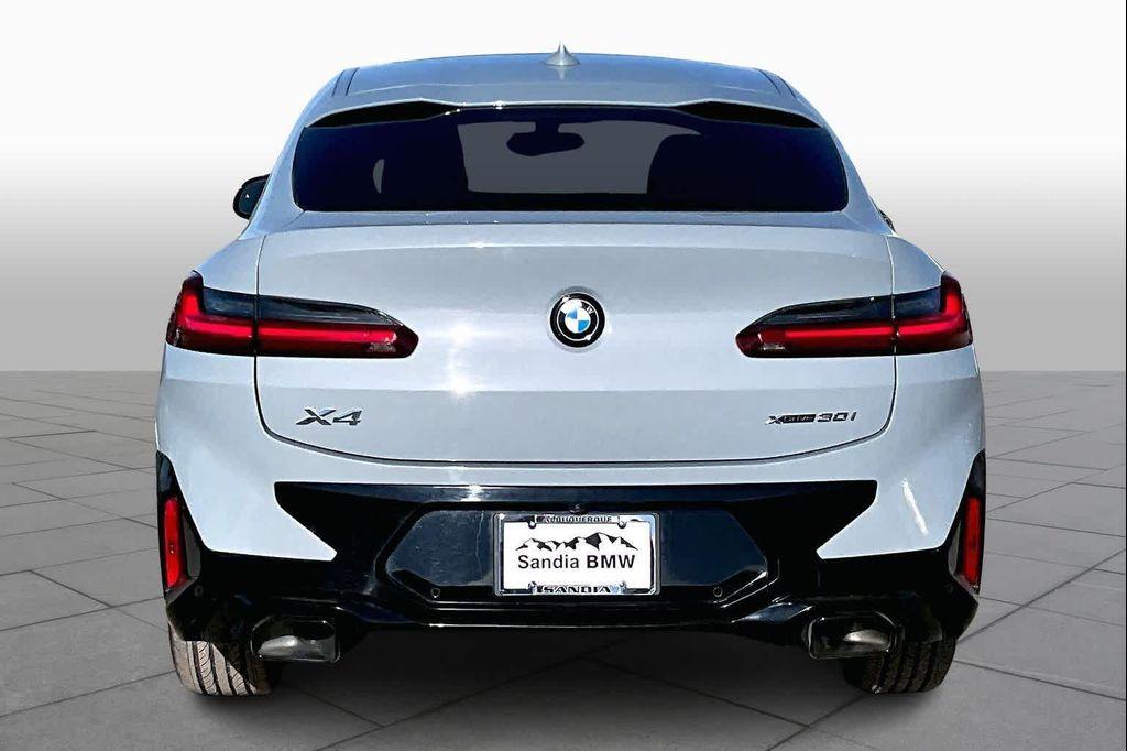 used 2023 BMW X4 car, priced at $47,950