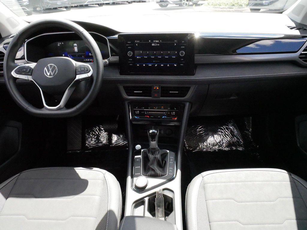 used 2025 Volkswagen Taos car, priced at $26,825