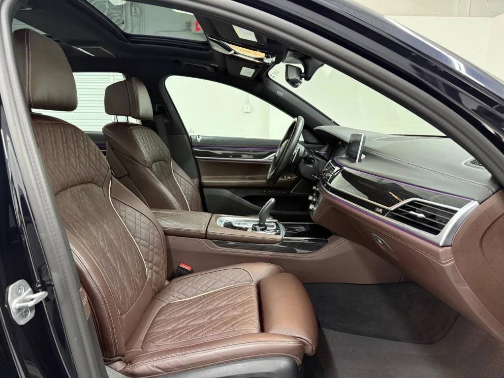 used 2022 BMW 750 car, priced at $47,233