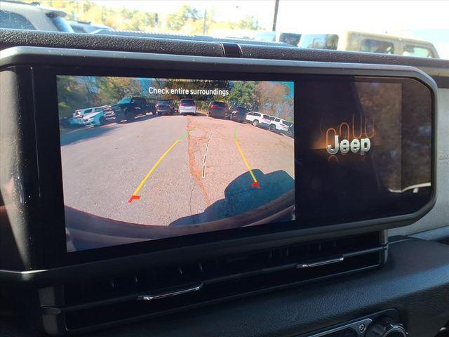 used 2024 Jeep Wrangler car, priced at $29,395