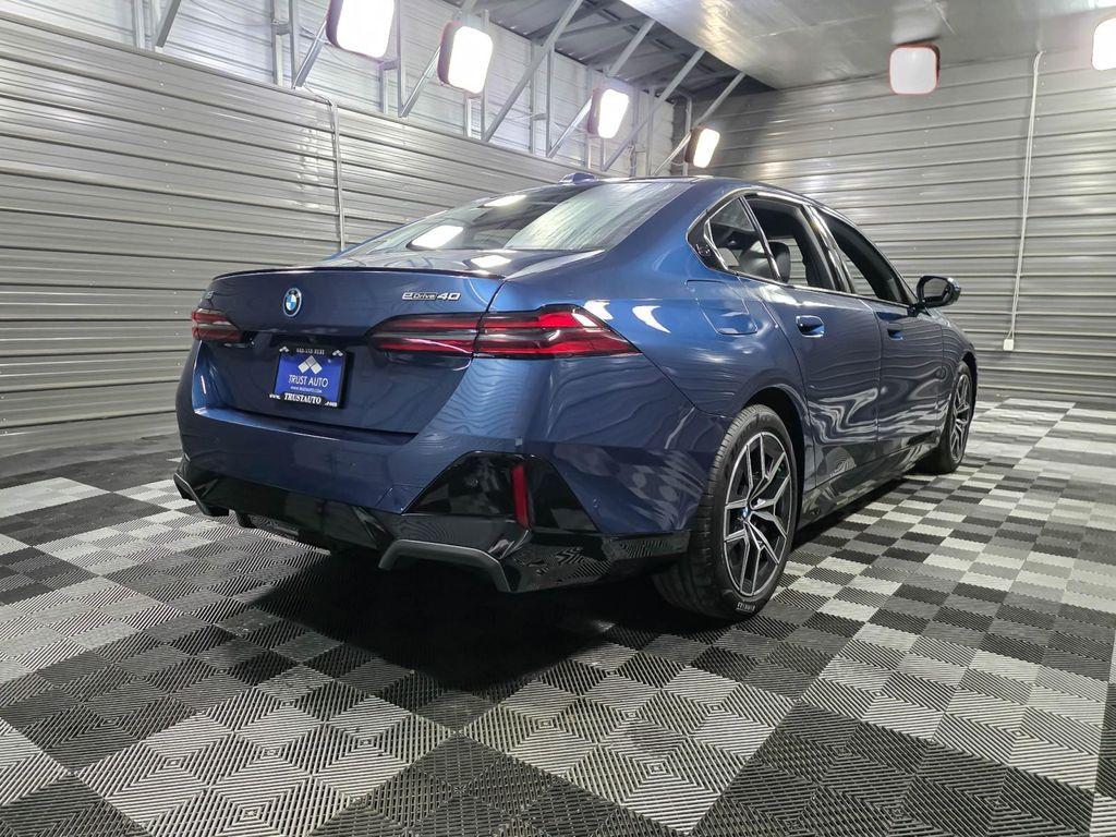 used 2026 BMW i5 car, priced at $59,995