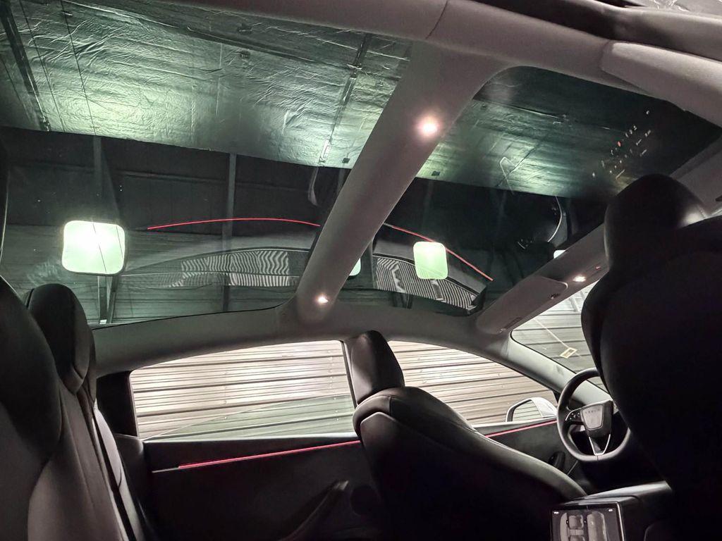 used 2025 Tesla Model 3 car, priced at $38,595