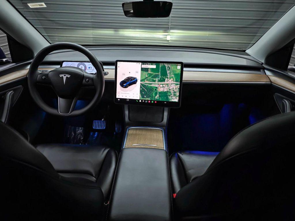 used 2025 Tesla Model Y car, priced at $43,595