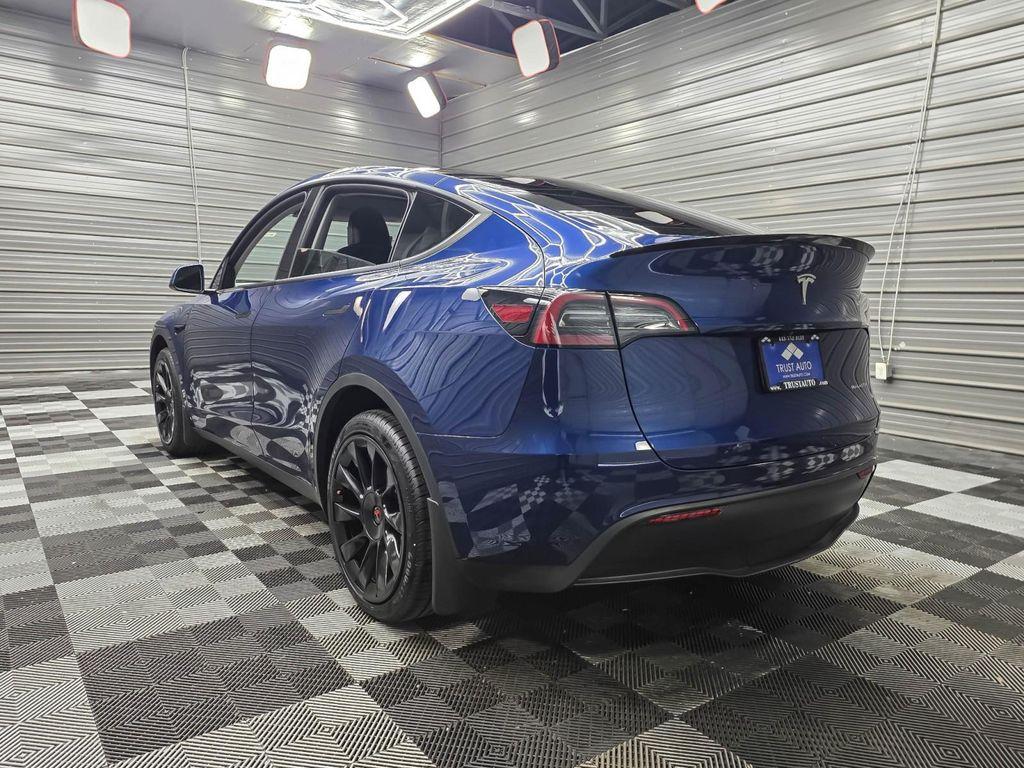 used 2025 Tesla Model Y car, priced at $43,595