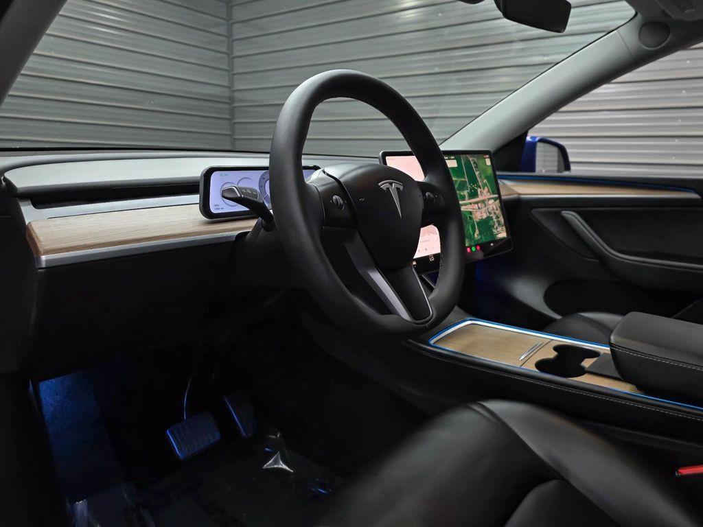 used 2025 Tesla Model Y car, priced at $43,595