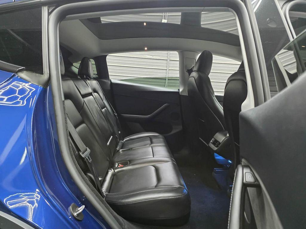used 2025 Tesla Model Y car, priced at $43,595