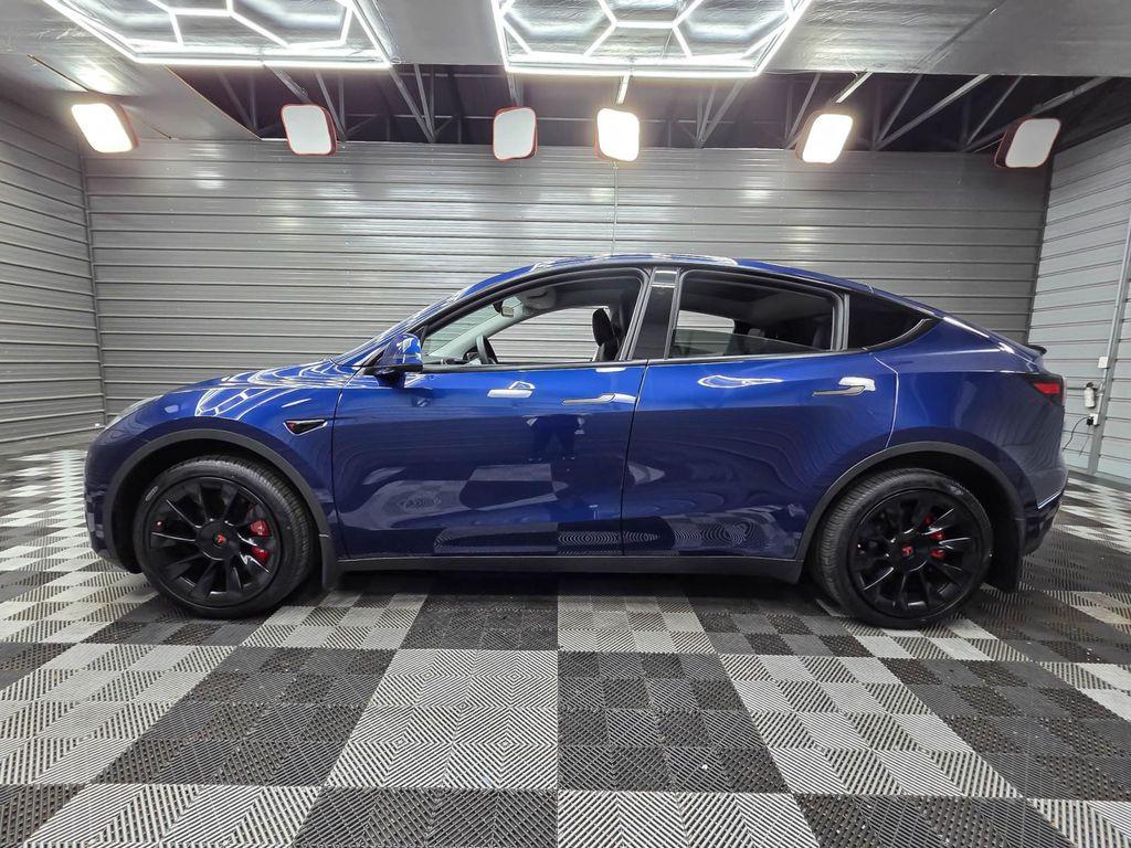 used 2025 Tesla Model Y car, priced at $43,595