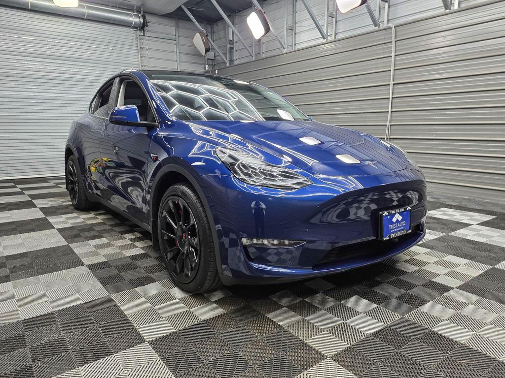 used 2025 Tesla Model Y car, priced at $43,595
