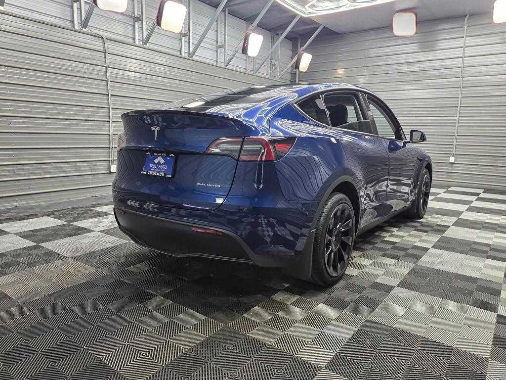 used 2025 Tesla Model Y car, priced at $43,595
