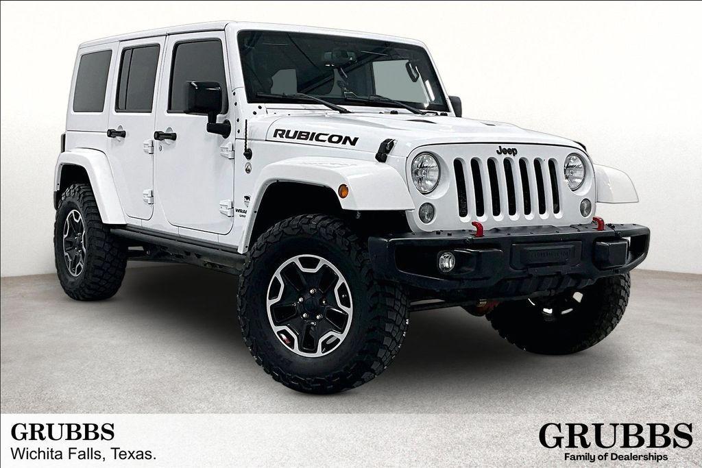 used 2015 Jeep Wrangler Unlimited car, priced at $13,695