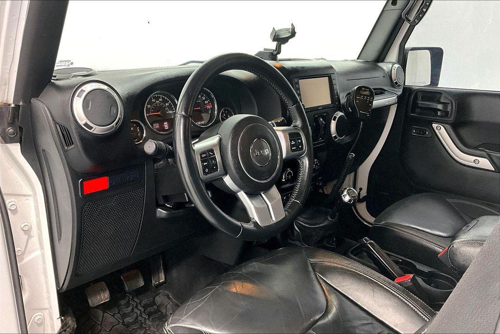 used 2015 Jeep Wrangler Unlimited car, priced at $13,695