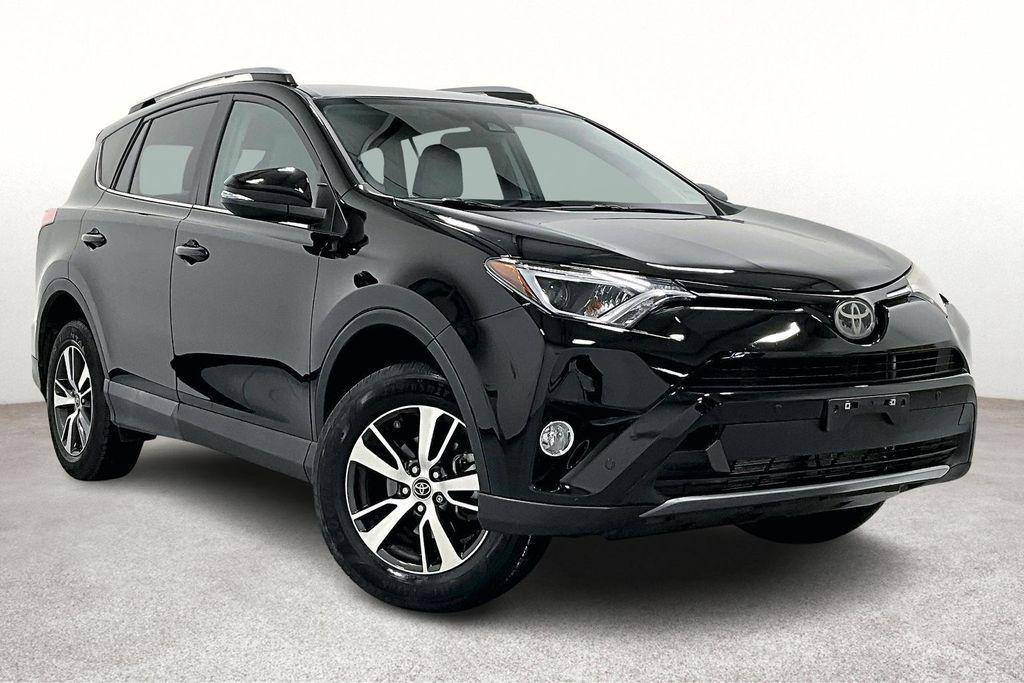 used 2018 Toyota RAV4 car, priced at $18,000