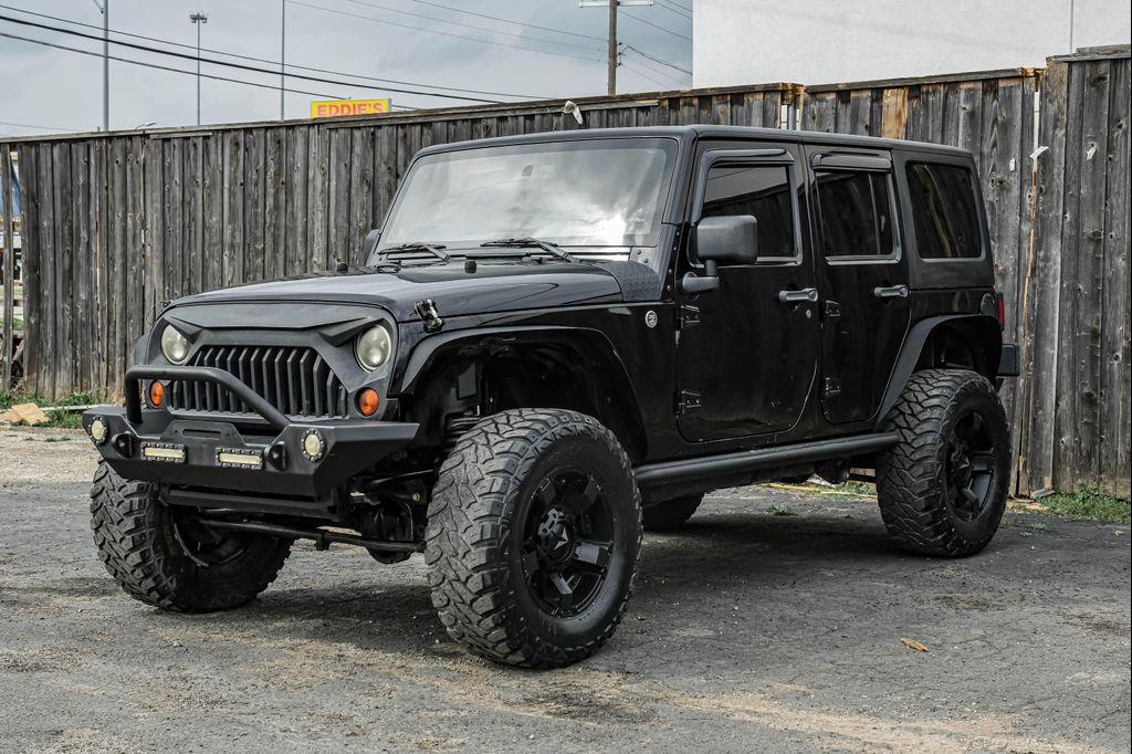 used 2013 Jeep Wrangler Unlimited car, priced at $12,495