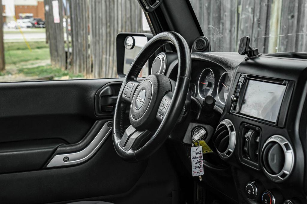 used 2013 Jeep Wrangler Unlimited car, priced at $12,495