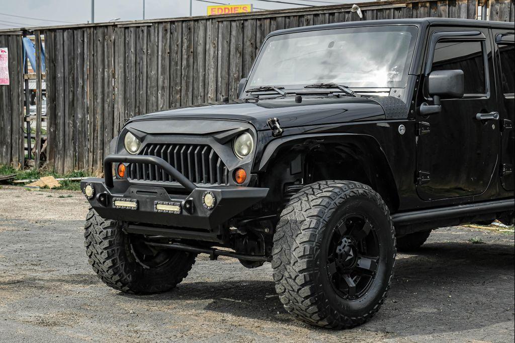 used 2013 Jeep Wrangler Unlimited car, priced at $12,495