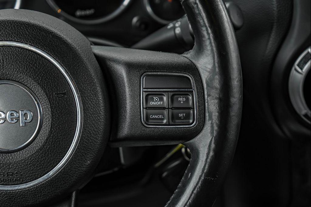used 2013 Jeep Wrangler Unlimited car, priced at $12,495