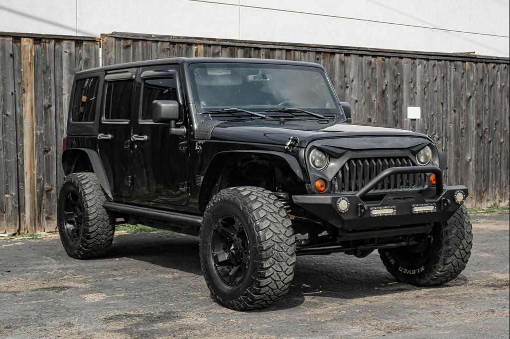 used 2013 Jeep Wrangler Unlimited car, priced at $12,495