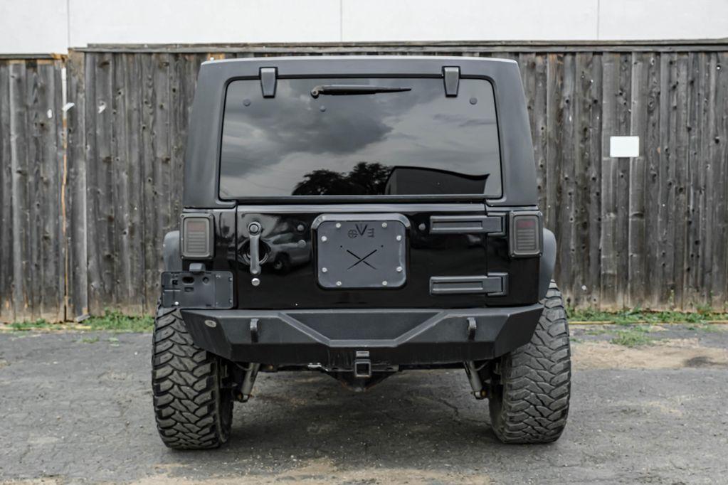 used 2013 Jeep Wrangler Unlimited car, priced at $12,495
