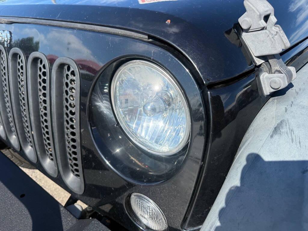 used 2016 Jeep Wrangler Unlimited car, priced at $15,397
