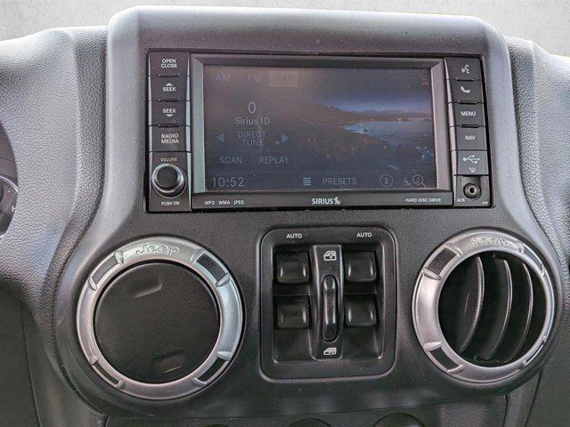 used 2015 Jeep Wrangler Unlimited car, priced at $15,561