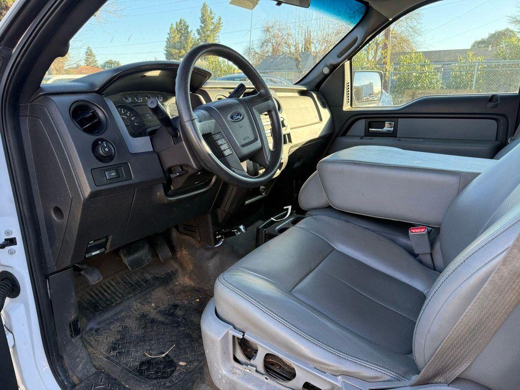 used 2014 Ford F-150 car, priced at $15,000