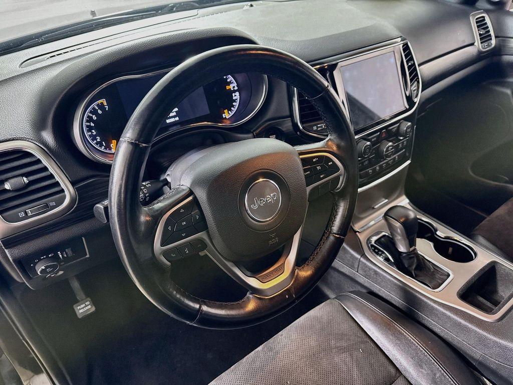used 2021 Jeep Grand Cherokee car, priced at $21,574