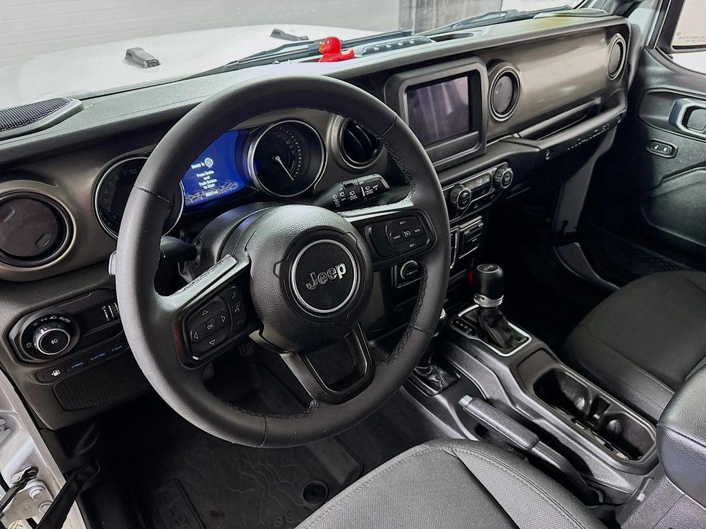 used 2023 Jeep Wrangler 4xe car, priced at $27,590