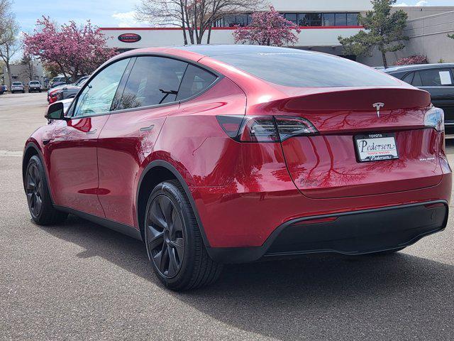 used 2025 Tesla Model Y car, priced at $39,590