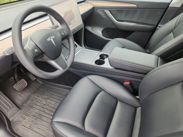 used 2025 Tesla Model Y car, priced at $39,590