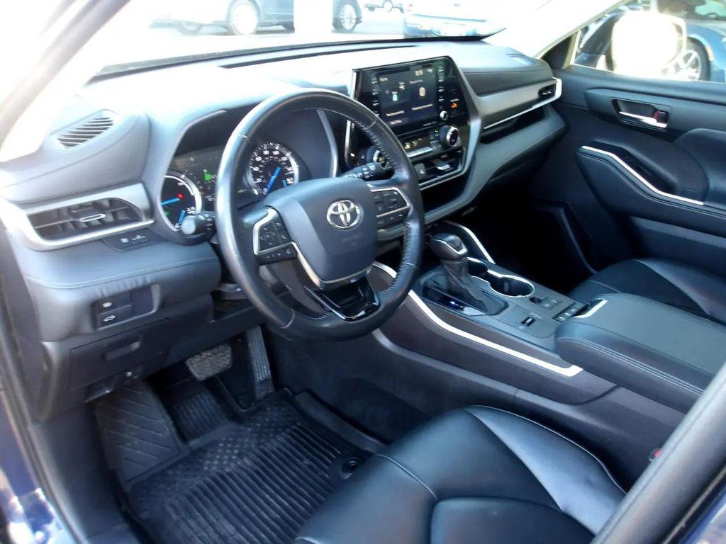 used 2021 Toyota Highlander Hybrid car, priced at $28,245