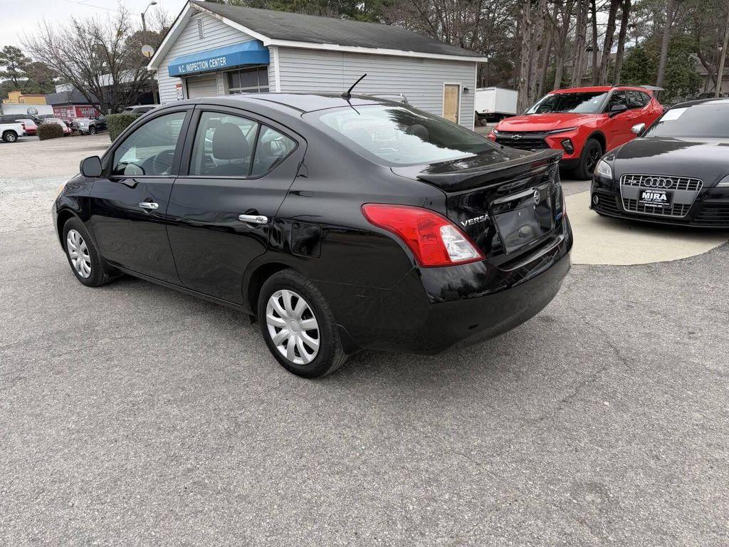 used 2014 Nissan Versa car, priced at $5,995