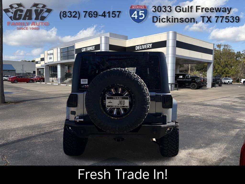used 2015 Jeep Wrangler Unlimited car, priced at $14,991