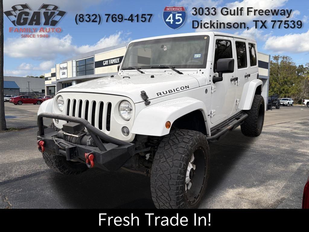 used 2015 Jeep Wrangler Unlimited car, priced at $16,991