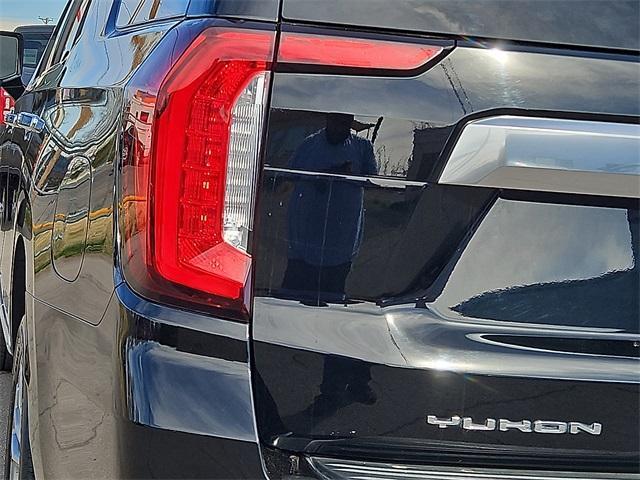 used 2021 GMC Yukon car, priced at $49,999