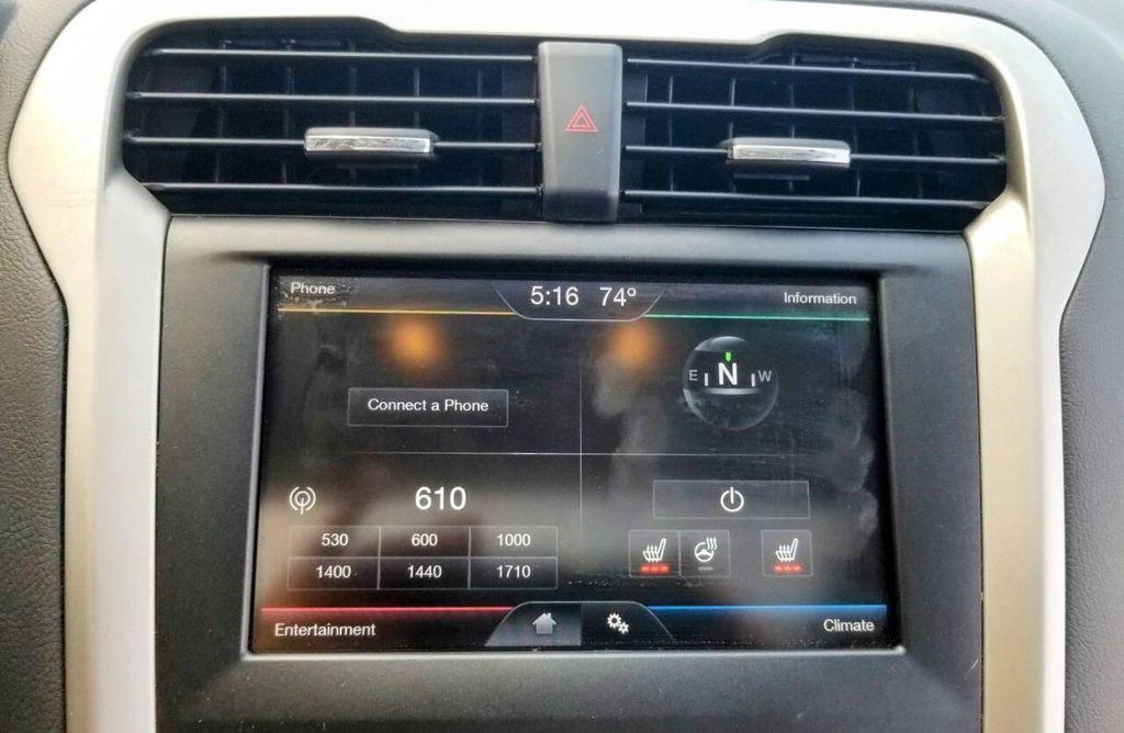 used 2015 Ford Fusion car, priced at $12,750