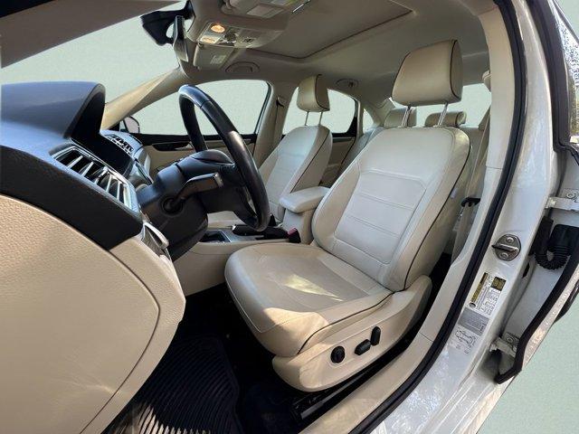 used 2016 Volkswagen Passat car, priced at $12,000