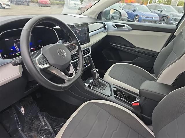 used 2025 Volkswagen Taos car, priced at $22,999