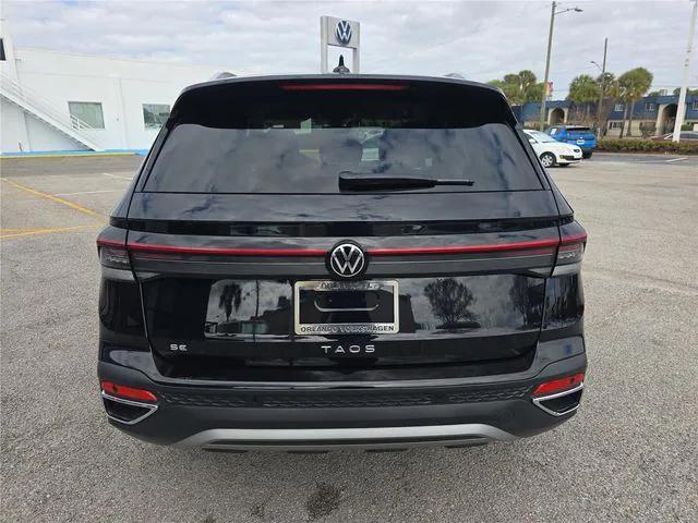 used 2025 Volkswagen Taos car, priced at $24,895