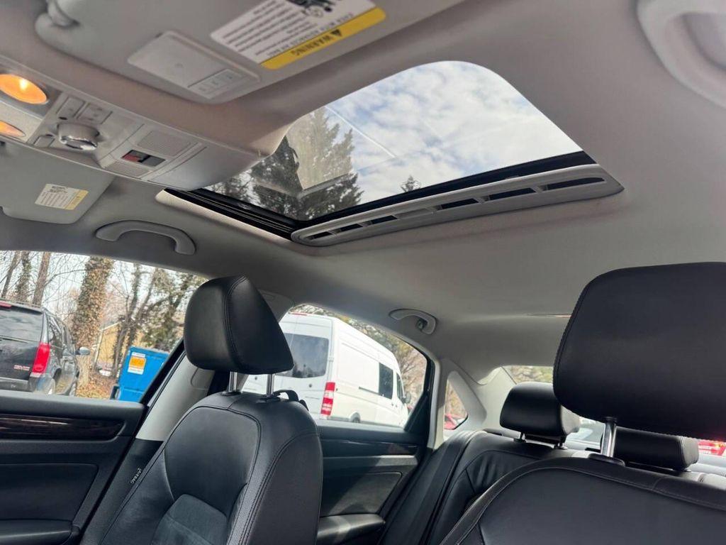 used 2014 Volkswagen Passat car, priced at $9,995