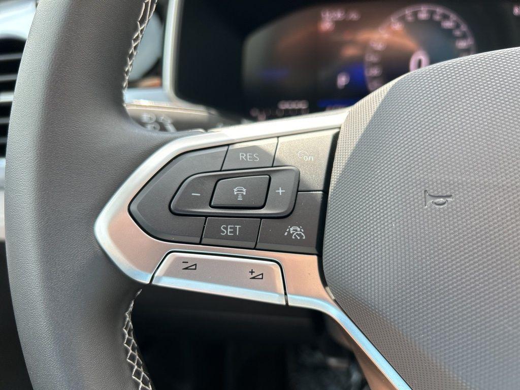 used 2025 Volkswagen Taos car, priced at $25,995