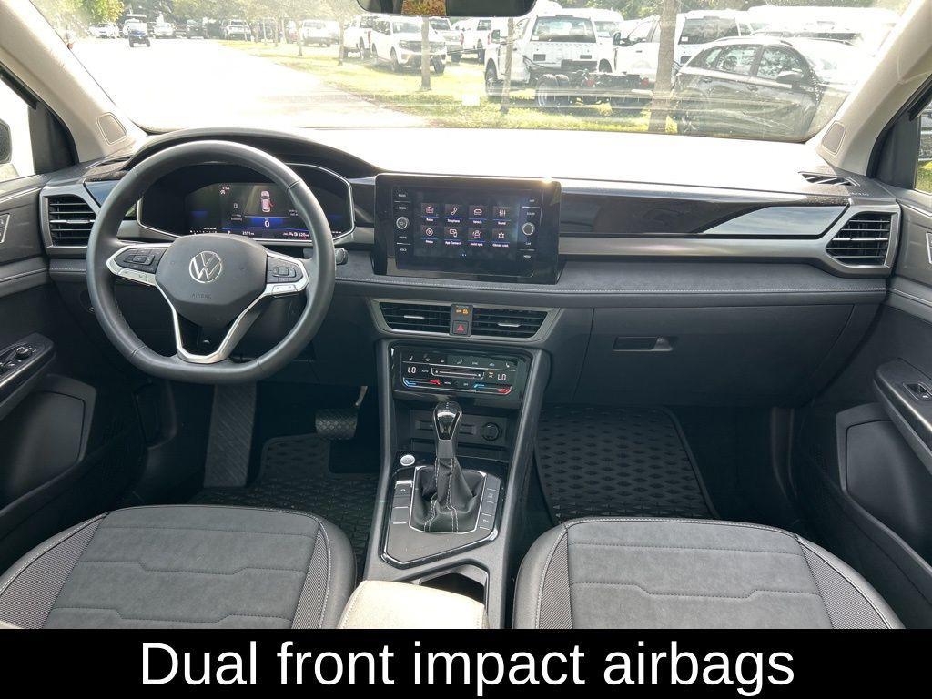 used 2025 Volkswagen Taos car, priced at $24,295