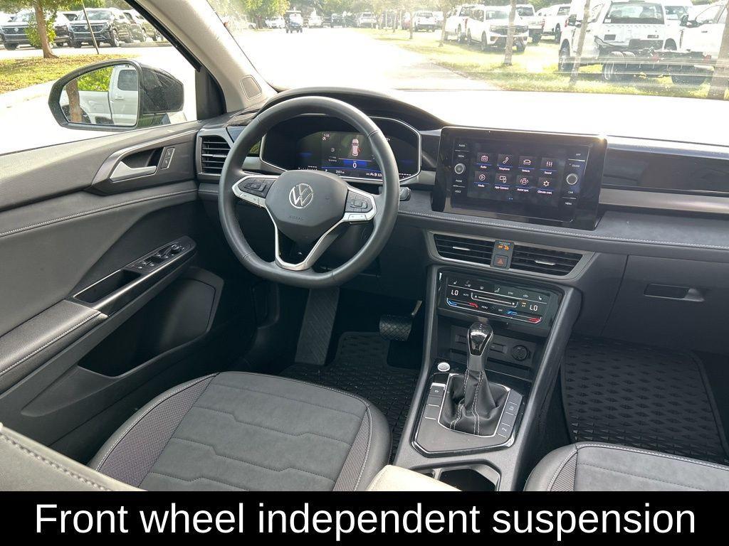 used 2025 Volkswagen Taos car, priced at $24,295