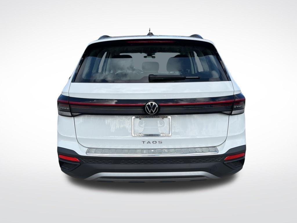 used 2025 Volkswagen Taos car, priced at $20,595
